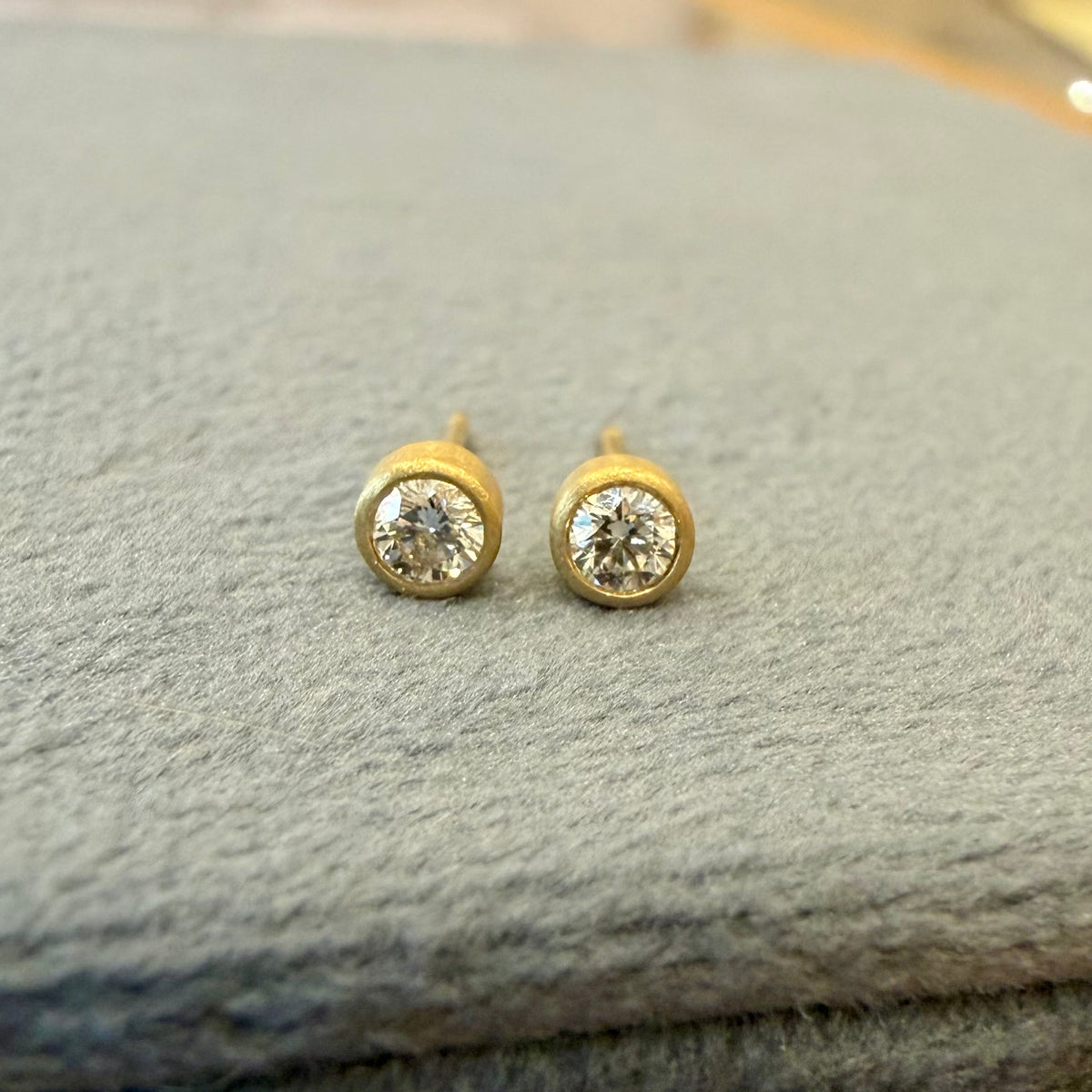 teeny studs - 10 pt diamonds