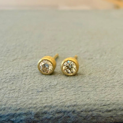 teeny studs - 10 pt diamonds