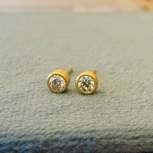 teeny studs - 10 pt diamonds