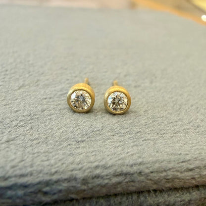 teeny studs - 10 pt diamonds