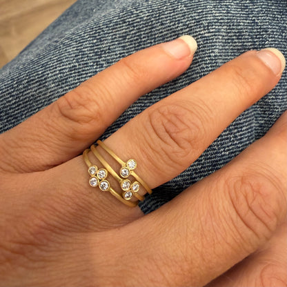 teeny ring - double cluster with 2 pt diamonds