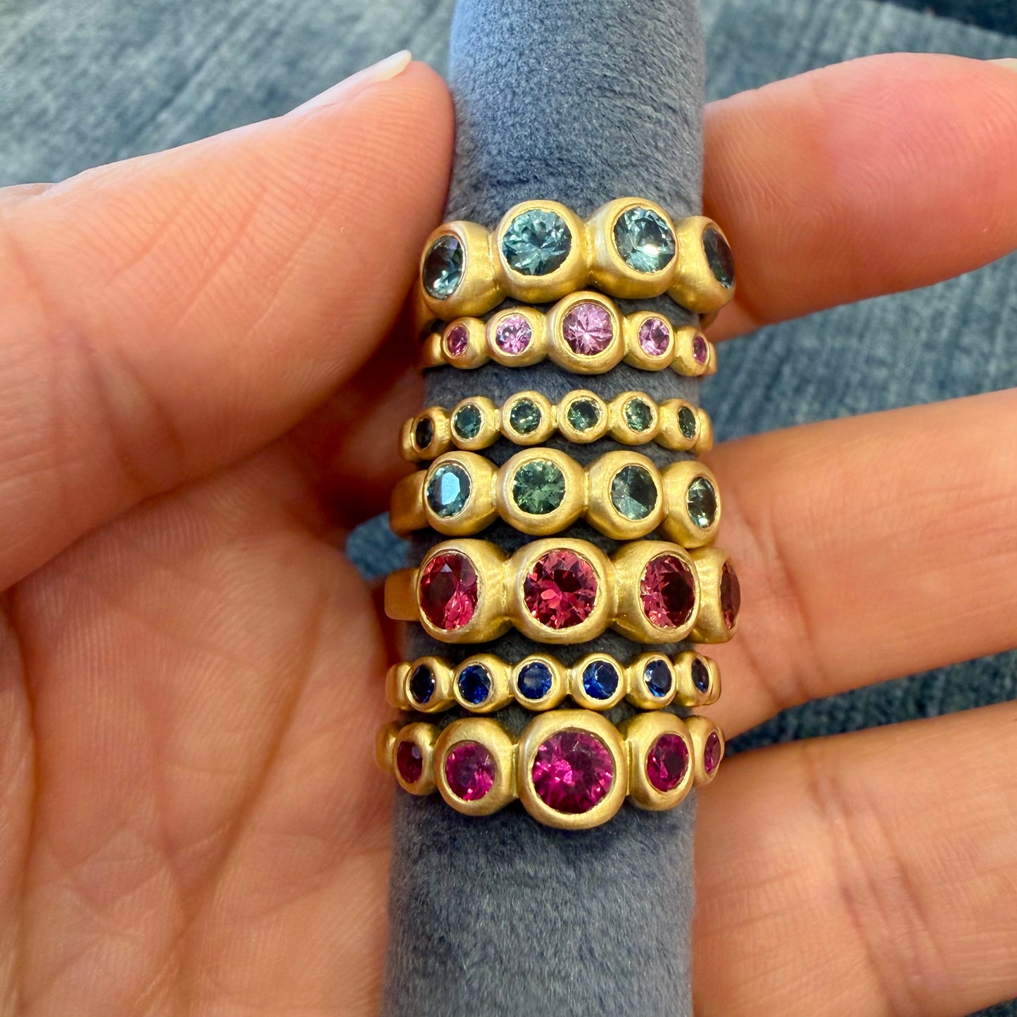 kima ring - 5 stone with pink sapphire