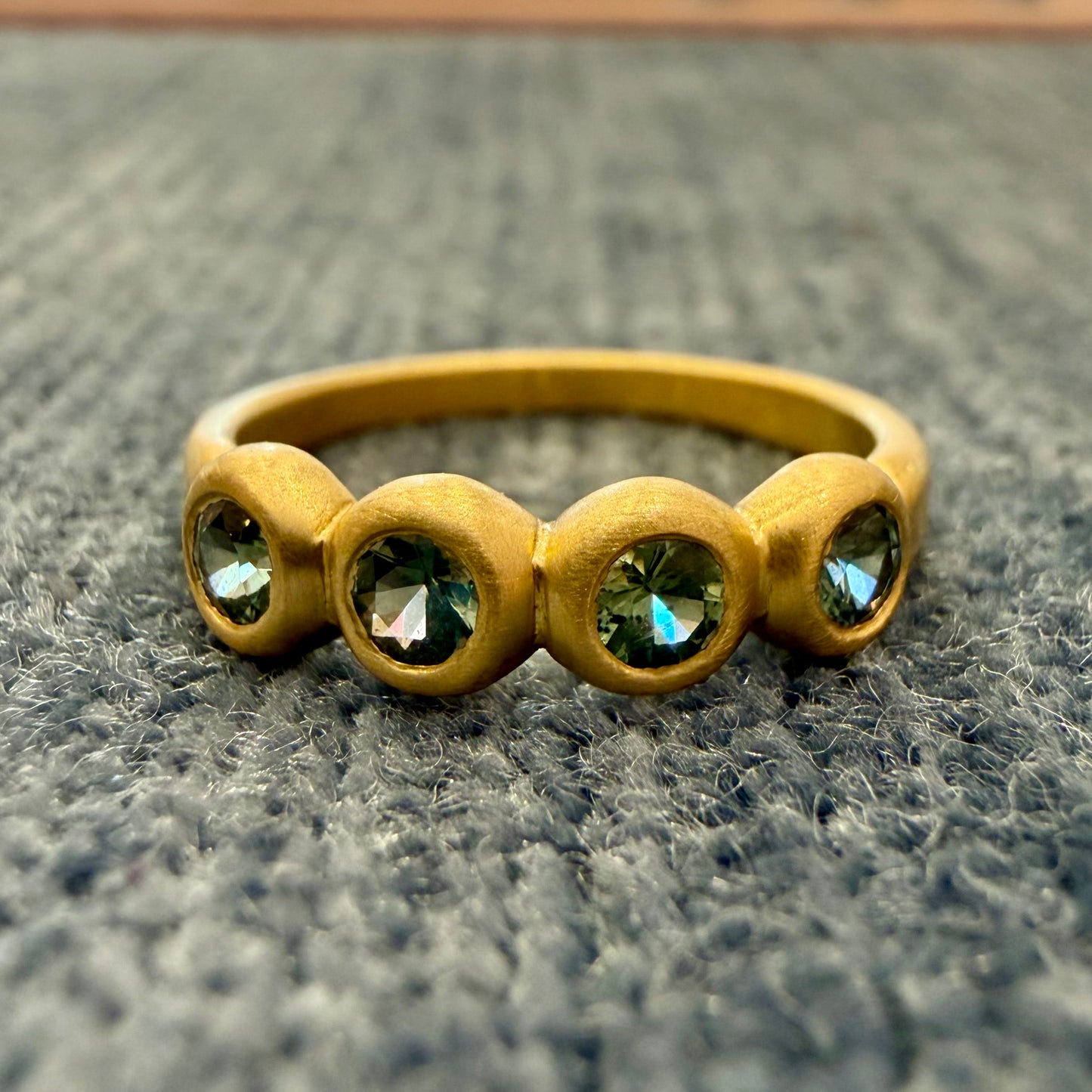 porch skimmer band with 3mm green montana sapphires