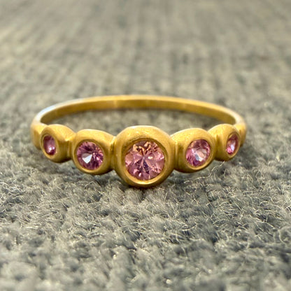 kima ring - 5 stone with pink sapphire