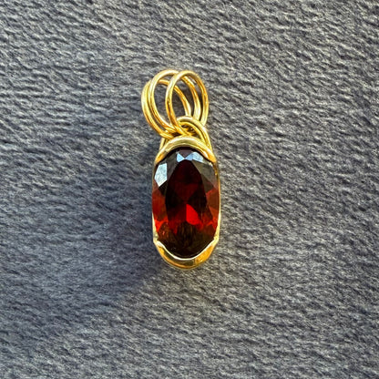garnet oval poppy bezel charm