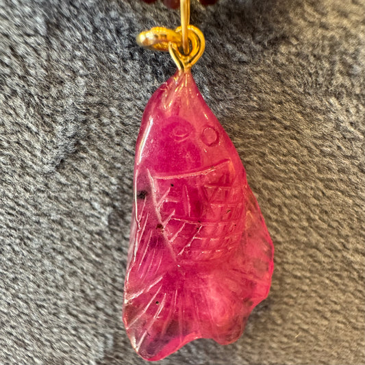 carved tourmaline fish charm
