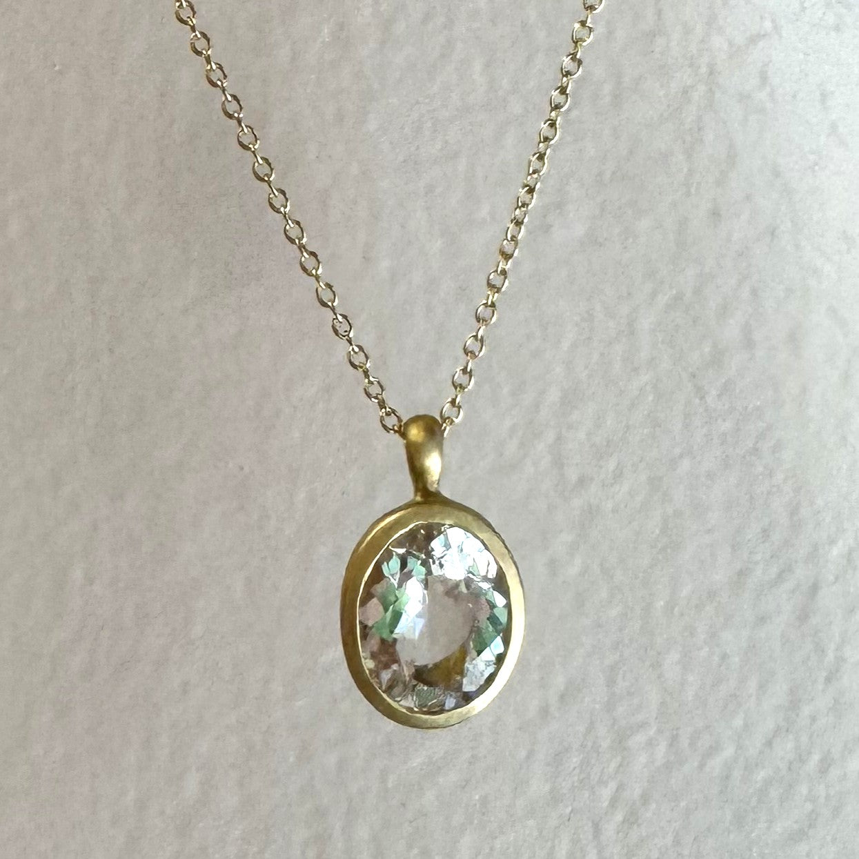 city pendant - oval goshenite